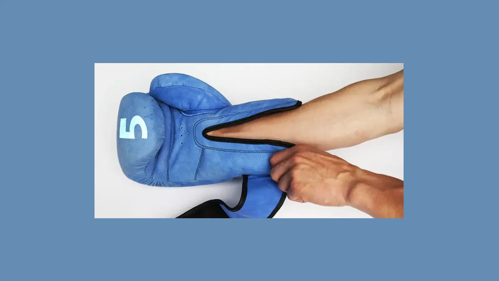 A blue boxing glove depicting 5 essential KPIs